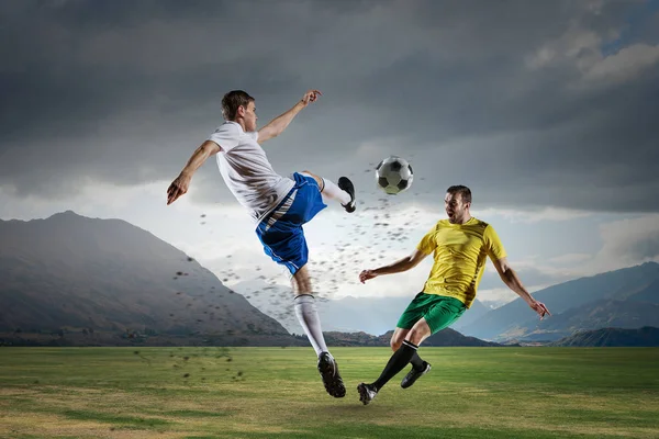 Soccer player outdoors . Mixed media — Stock Photo, Image