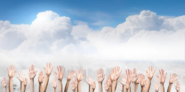 Group of people rise hands . Mixed media — Stock Photo, Image