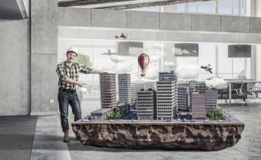 Genç bir mühendis adam. Karma ortam. Karışık teknik