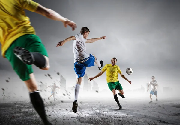 Soccer player outdoors . Mixed media — Stock Photo, Image