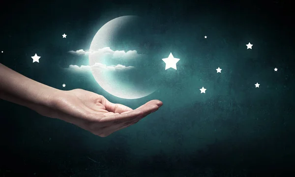 Lua na mão. Meios mistos — Fotografia de Stock