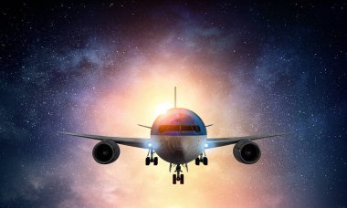 Gece gökyüzünde uçak. Karma ortam. Karışık teknik