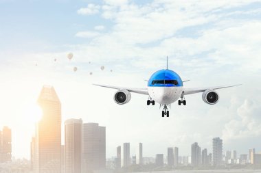 Uçak gün gökyüzünde. Karma ortam. Karışık teknik