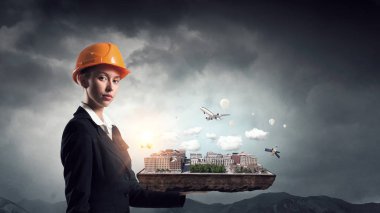 Kadın sunan inşaat modeli. Karışık teknik