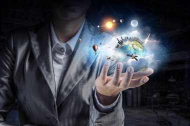 Bizim ellerde Dünya gezegeni. Karışık teknik