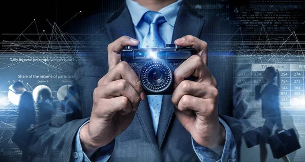 Man with camera in hands — Stock Photo, Image