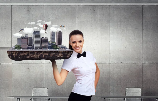 Woman presenting construction model. Mixed media — Stock Photo, Image