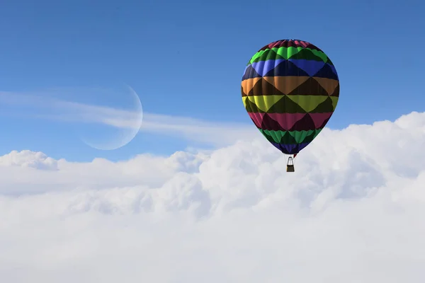 Aerostat flying above clouds — Stock Photo, Image