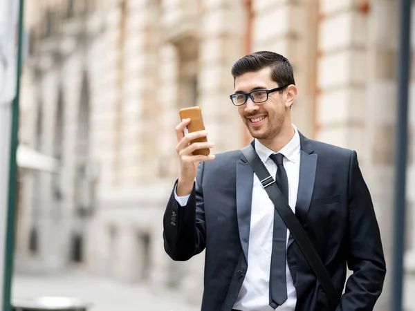 Young businessmen with a bike — Stock Photo, Image