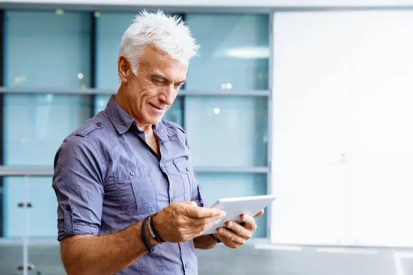 Handsome businessman in office — Stock Photo, Image