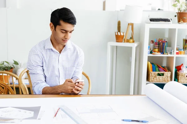 Young man architect in office — Stock Photo, Image