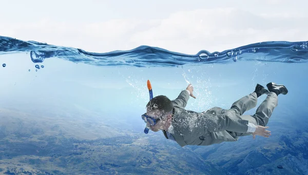 Diving in water businessman . Mixed media . Mixed media — Stock Photo, Image