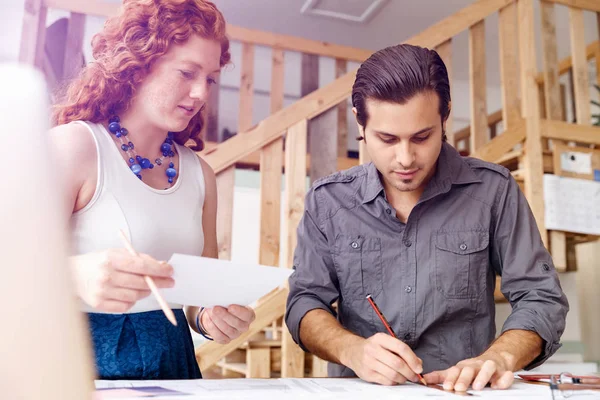 Two young architects in office — Stock Photo, Image