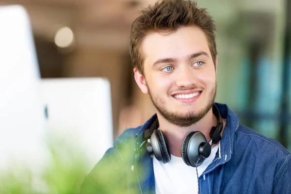 Young man working in office — Stock Photo, Image