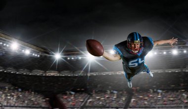 Merkezi oyuncu topu elinde. Karışık teknik