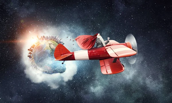 Santa hediyeler teslim için aceleyle. Karışık teknik