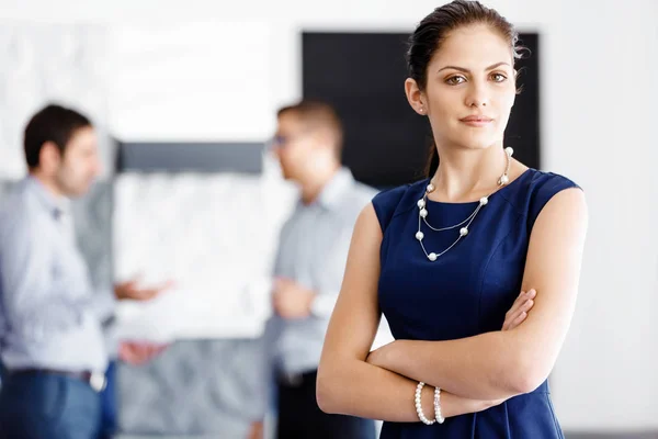 Attractive office worker standing — Stock Photo, Image