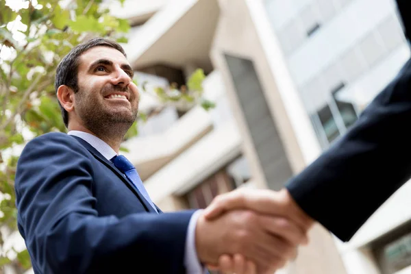 Two businessmen shaking their hands — Stock Photo, Image