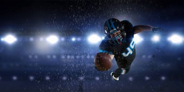 Merkezi oyuncu topu elinde. Karışık teknik