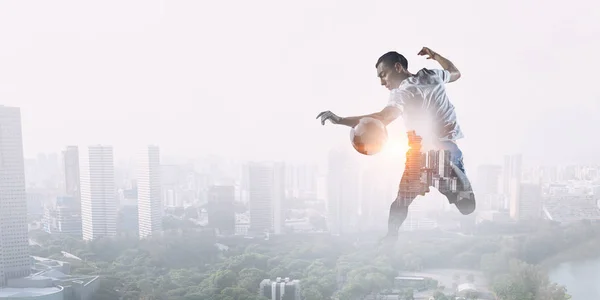 Soccer player in action. Mixed media — Stock Photo, Image