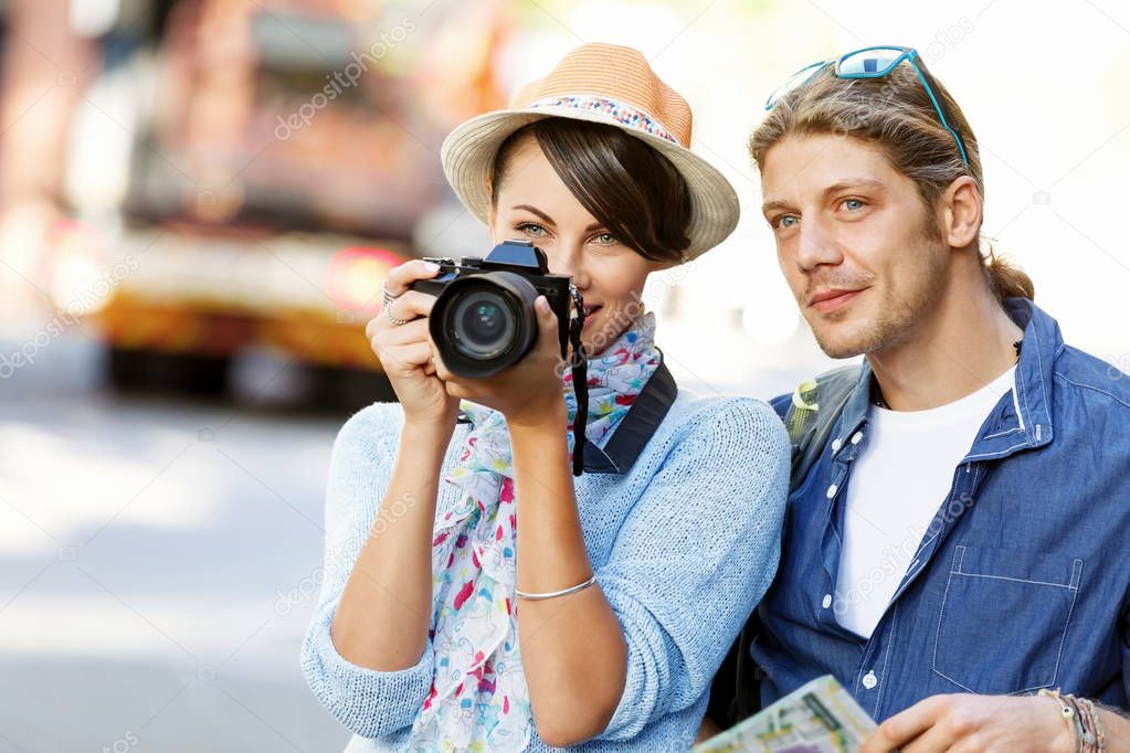 Smiling couple with the camera