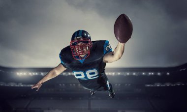 Merkezi oyuncu topu elinde. Karışık teknik