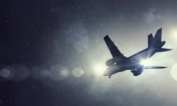Airliner in night sky — Stock Photo, Image