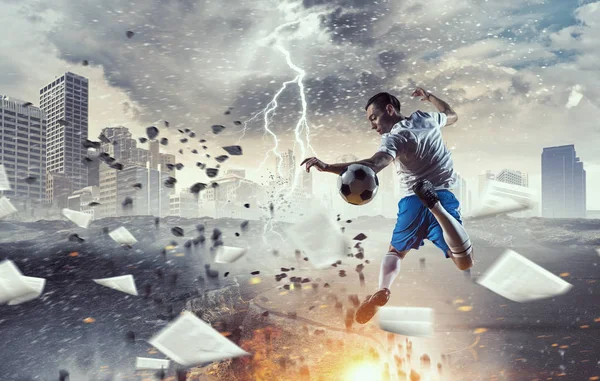 Soccer player in action. Mixed media — Stock Photo, Image