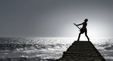 Rock gitar kızla. Karışık teknik