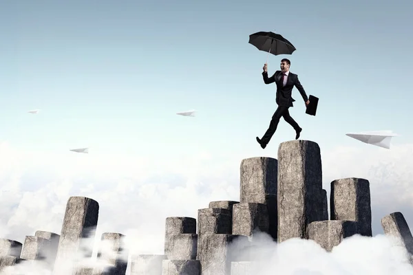 Eleganter Banker mit Regenschirm. Gemischte Medien — Stockfoto