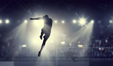 Eylem futbol oyuncusu. Karışık teknik