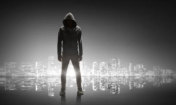 Silhouette of man in hoody — Stock Photo, Image