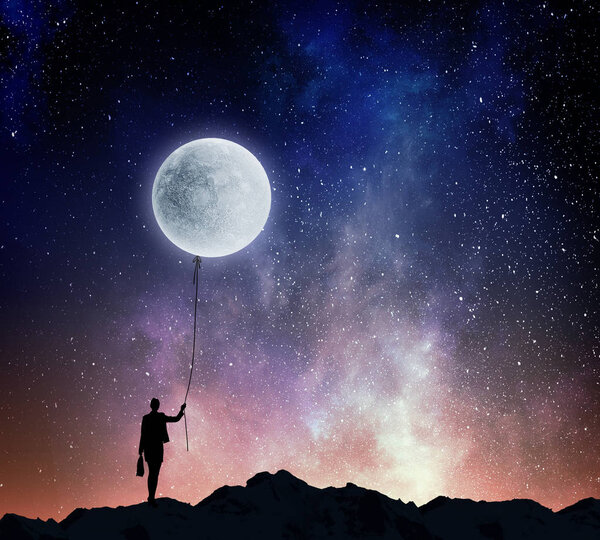 Woman catching moon . Mixed media