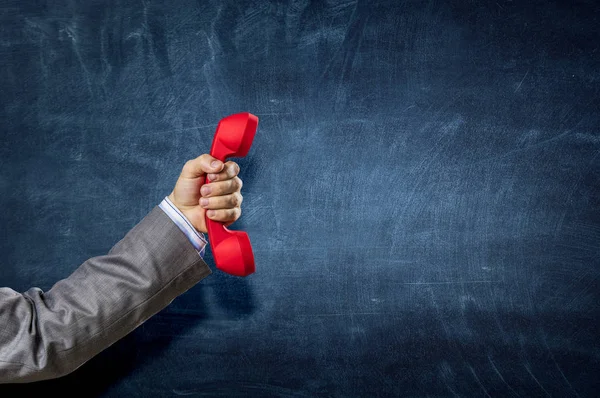 Telefoon ontvanger in de hand. Mixed media — Stockfoto