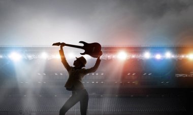 Rock gitar kızla. Karışık teknik