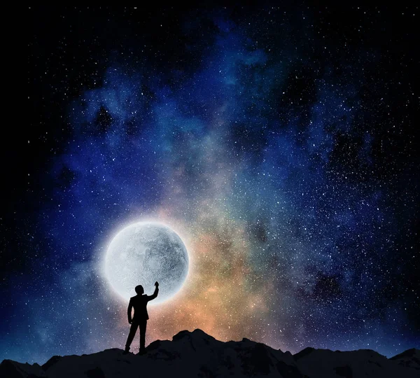 Reaching the moon. Mixed media — Stock Photo, Image