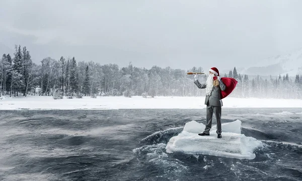 Santa looking for the way. Mixed media — Stock Photo, Image