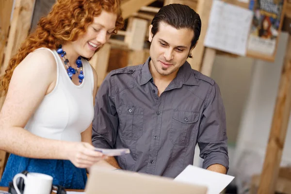 Two young people in office — Stock Photo, Image