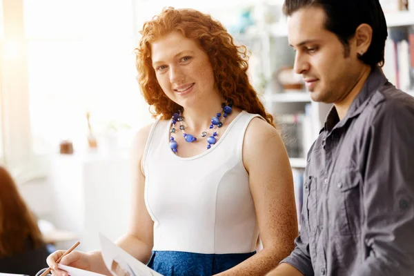 Two young people in office — Stock Photo, Image