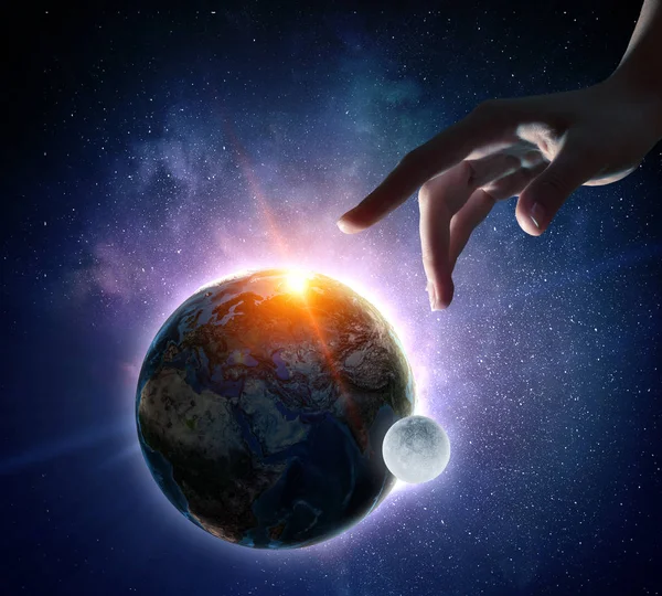 Touching planet with finger — Stock Photo, Image