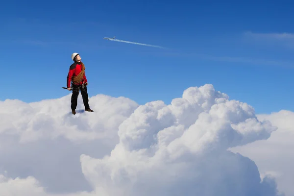 Extreme climbing is his adrenaline . Mixed media — Stock Photo, Image