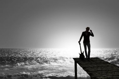 Gitar rock adam. Karışık teknik