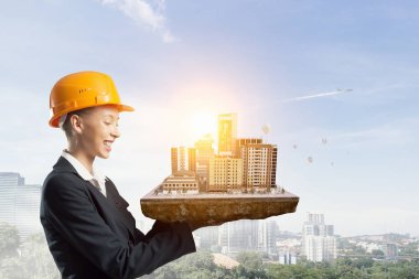 Kadın sunan inşaat projesi. Karışık teknik