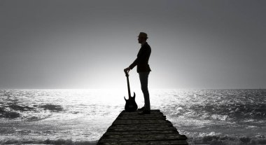 Gitar rock adam. Karışık teknik