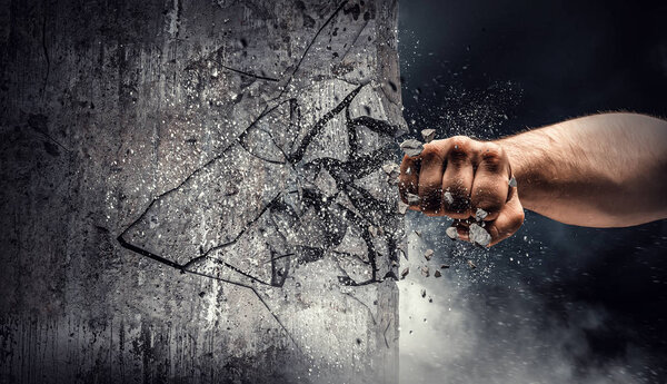 Рука пробивает стену. Смешанные медиа

