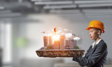 Kadın sunan inşaat projesi. Karışık teknik