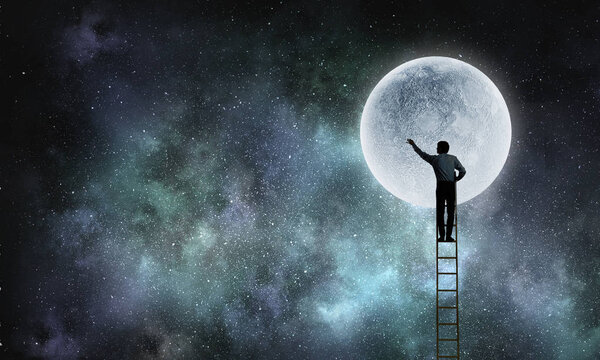 Businessman on ladder