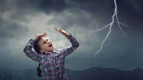 Kid scared with lightning. Mixed media — Stock Photo, Image