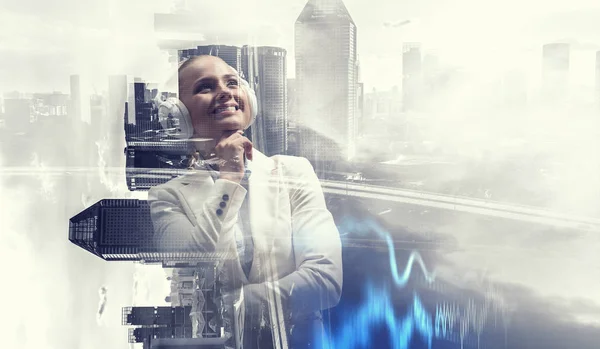 Woman wearing white headphones. Mixed media — Stock Photo, Image