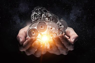 Dişli mekanizması elinde. Karışık teknik